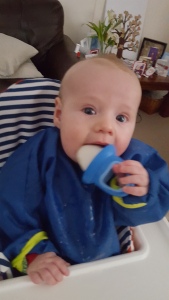 Having his first milk lolly